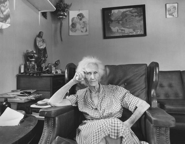 Old Woman sitting in a chair